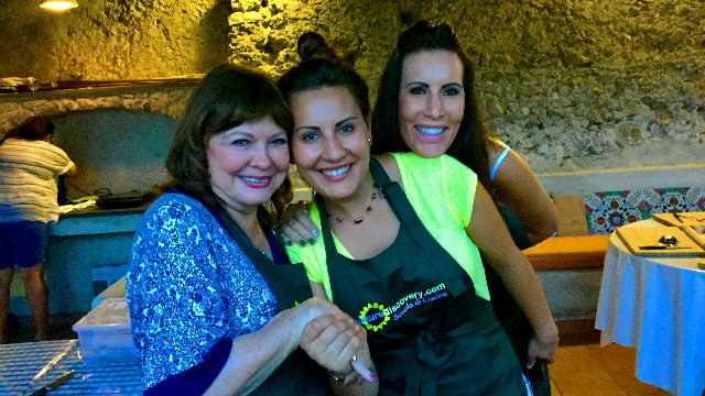 Guests smiling and having a good time during a hands on cooking classes on the Amalfi coast